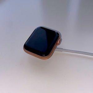 Gently used AppleWatch SE GPS 40mm Rose Gold. Two bands. Charger included.